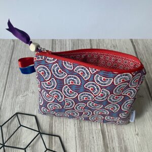 Pochette matelassée, style wax rouge bleu